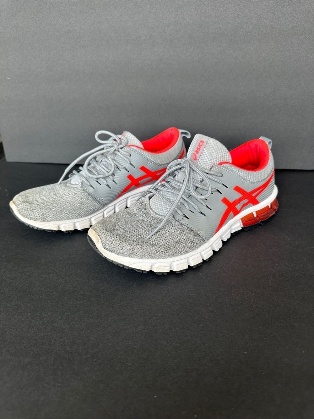 ASICS women’s grey and pink tennis shoes size 9.5